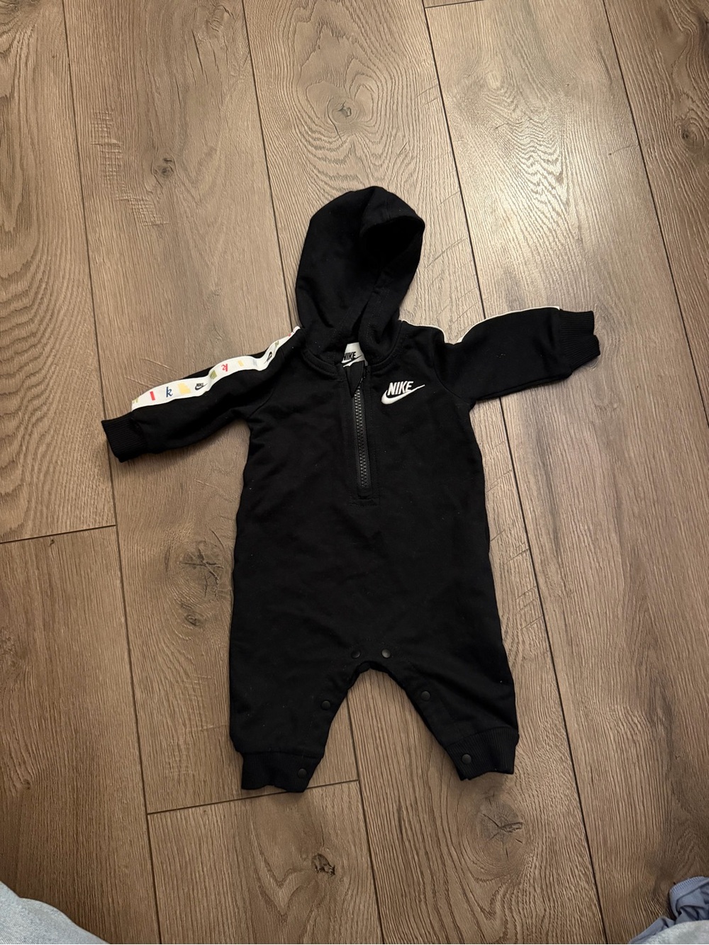Nike Black Hooded Baby One-Piece with Logo Stripe